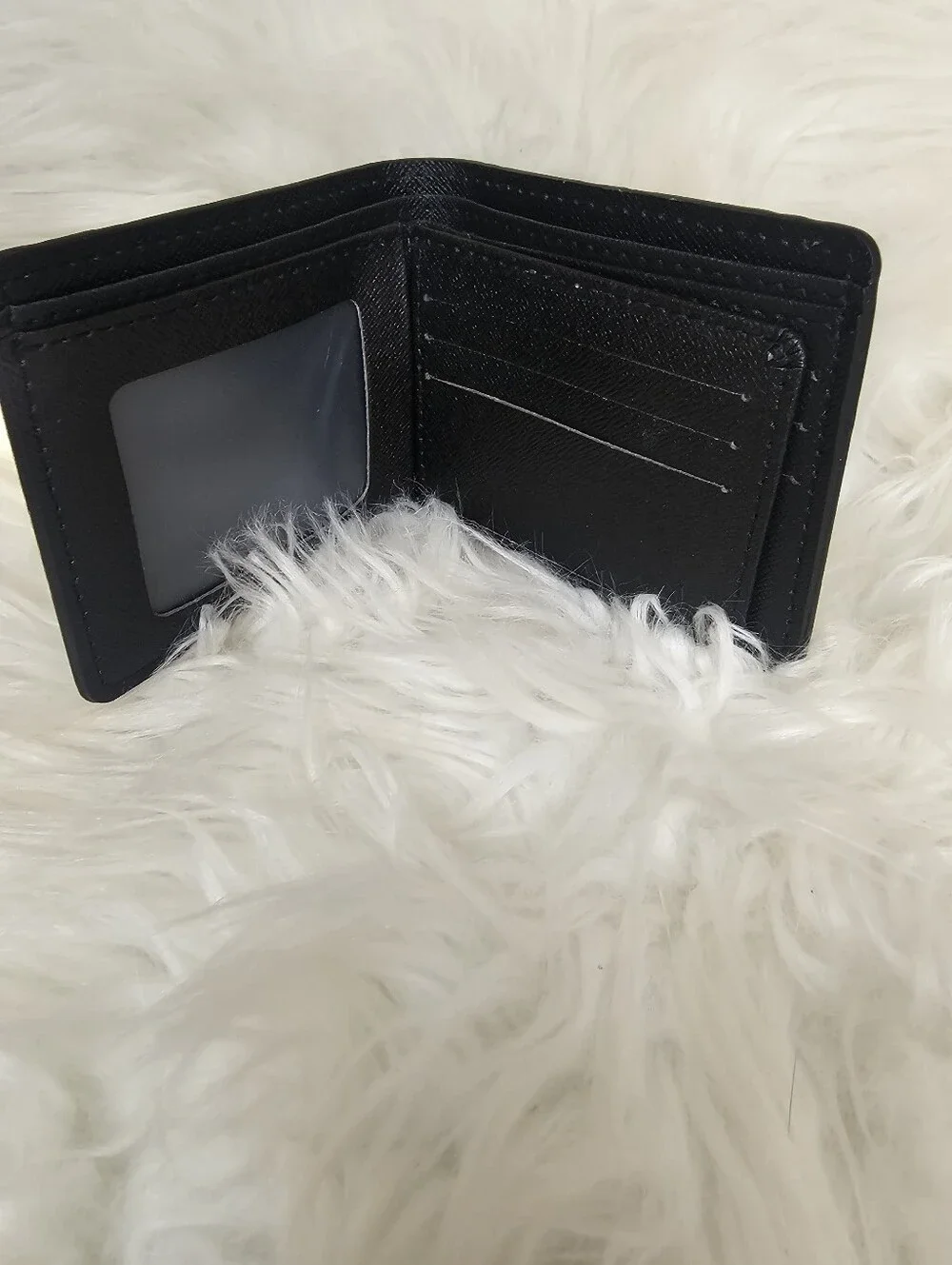 Black Embossed Leather Bifold Wallet